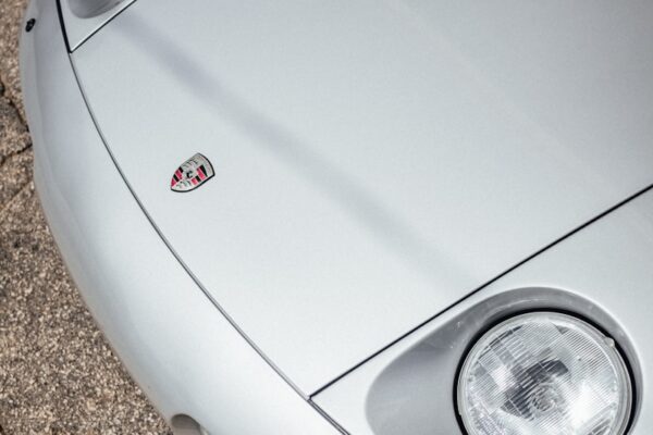 white car on brown concrete floor